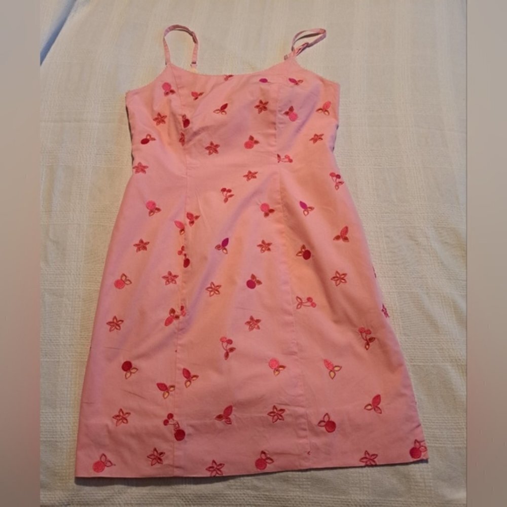 Lilly Pulitzer pale pink with yellow lining, embroidered design with cut outs